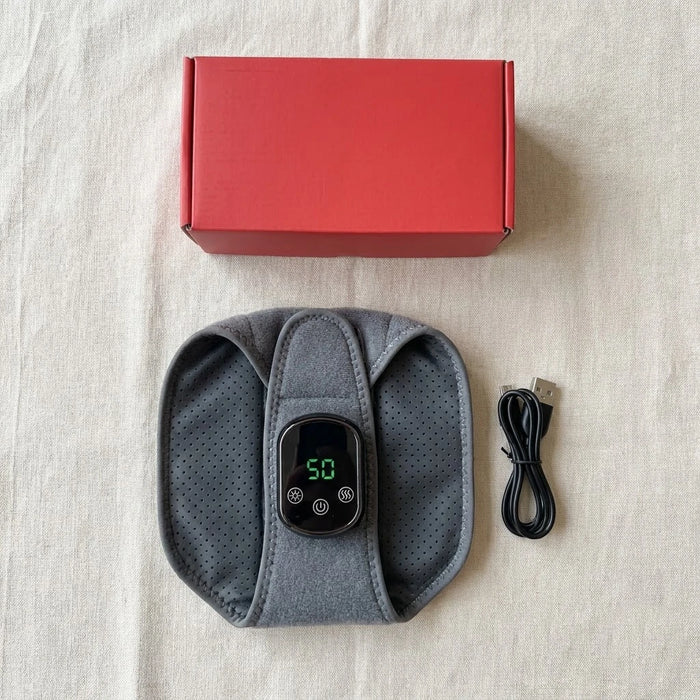 Wellivu wrist massager with USB charging cable and box contents